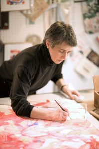 Sara Steele in her studio painting